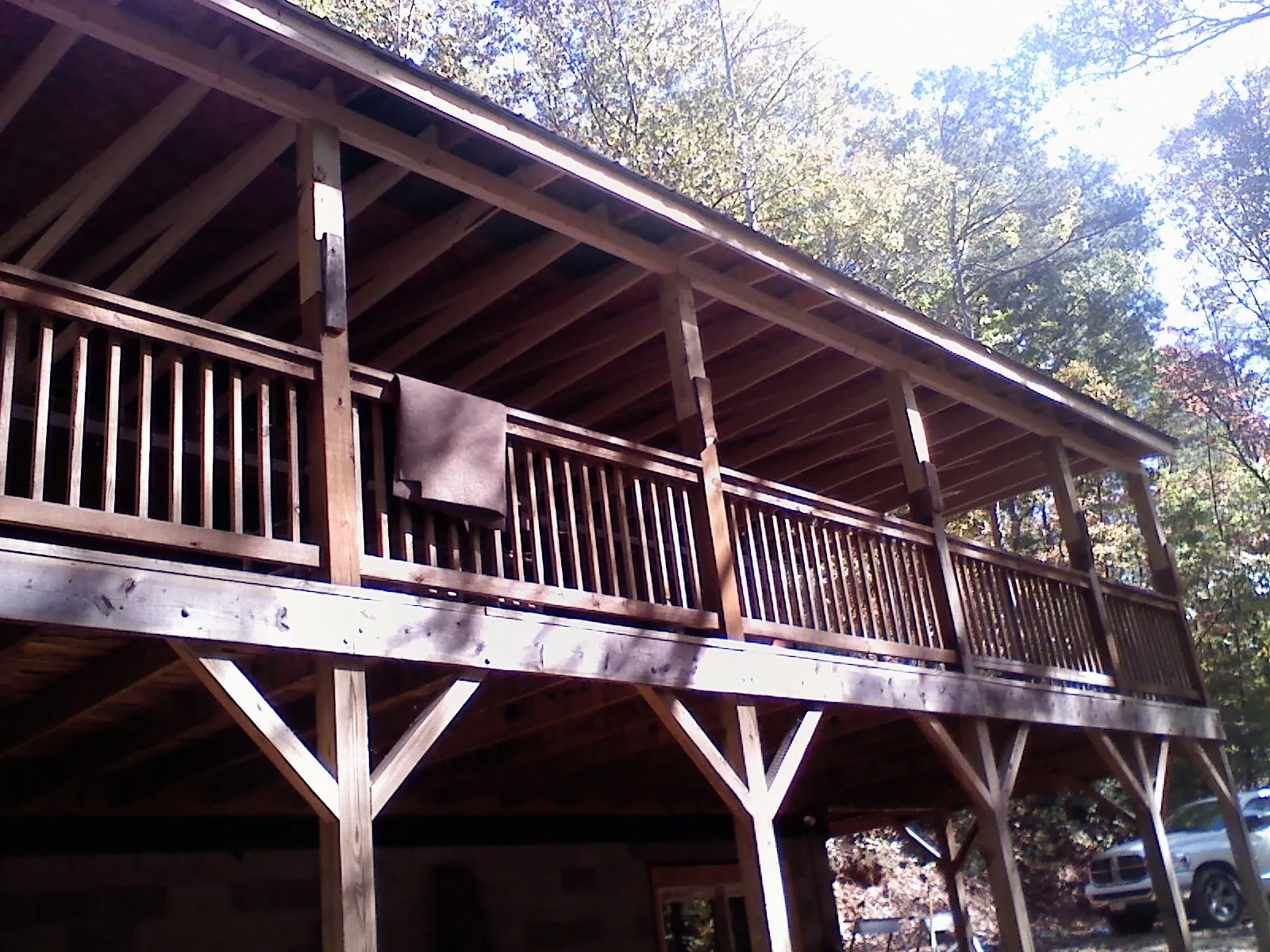 Timber framing under a new elevated porch and deck — Roof Leak Repair in Mantua by Roofing Brothers